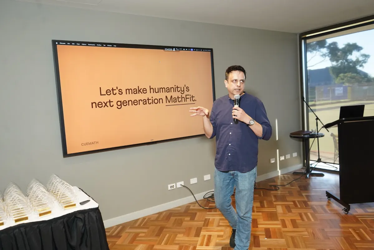 Manan Khurma on stage in Melbourne: "Let's make humanity's next generation MathFit"