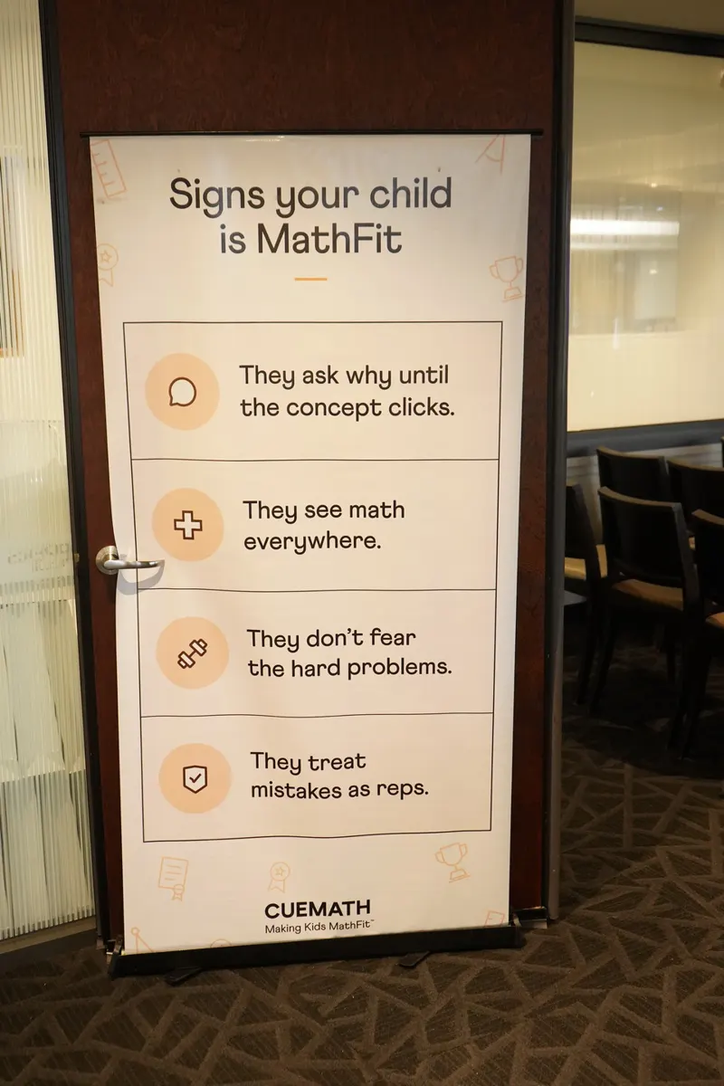 A standee listing the signs a child is MathFit